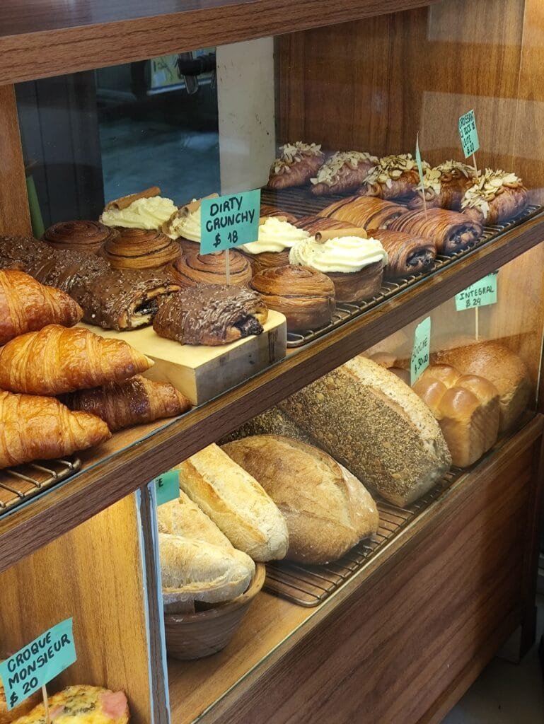 🥐 ALVA ARTISAN BAKERY IN COPACABANA: IS IT WORTH IT? PRICES AND WHAT TO ORDER 4 Showcase with breads and sweets alva artisan bakery copacabana