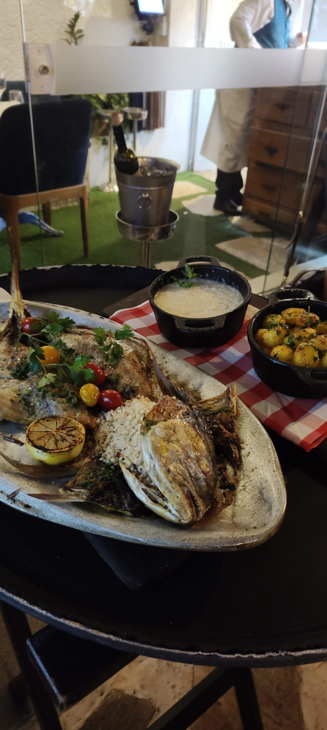 Main dish at Da Marino restaurant: grilled xerelete with Sicilian lemon risotto and browned baby potatoes