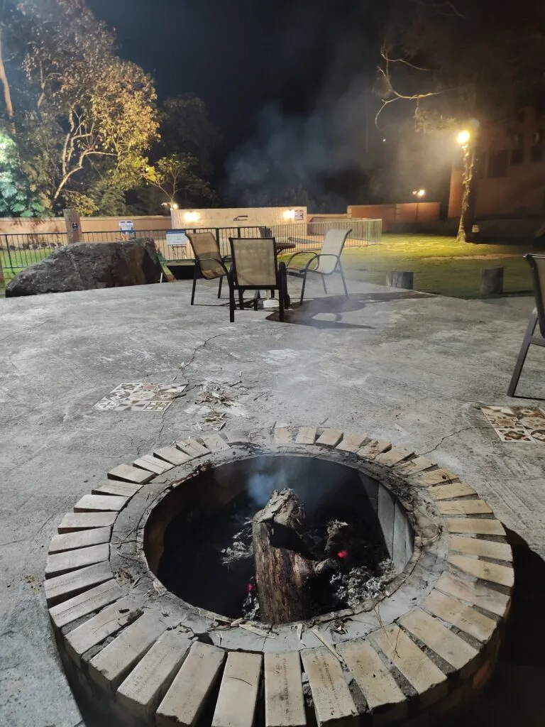 outdoor area with a fire pit at hotel vila suíça 1818